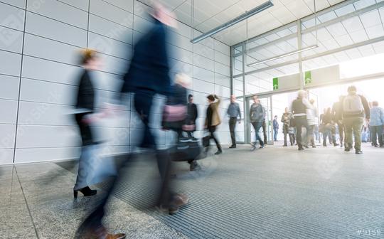 blurred Business people walking in the trade fair corridor  : Stock Photo or Stock Video Download rcfotostock photos, images and assets rcfotostock | RC Photo Stock.: