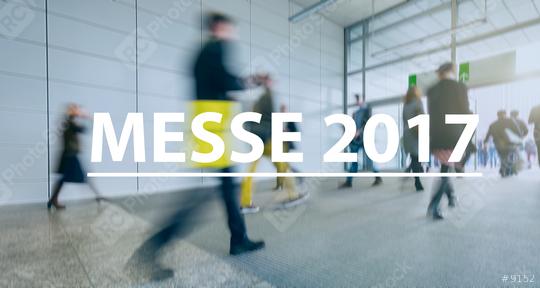 blurred Business people walking on a trade fair - text Concept image (Messe 2017)  : Stock Photo or Stock Video Download rcfotostock photos, images and assets rcfotostock | RC Photo Stock.: