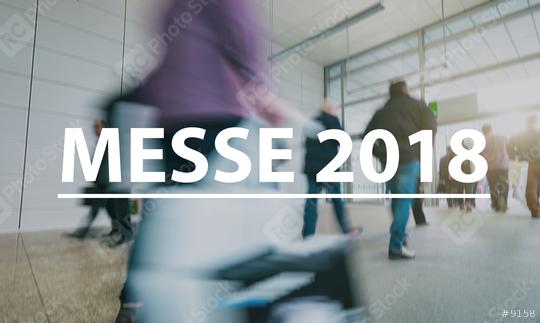 blurred Business people walking on a trade fair - text Concept image (Messe 2018)  : Stock Photo or Stock Video Download rcfotostock photos, images and assets rcfotostock | RC Photo Stock.: