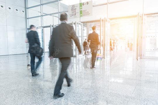 Blurred business people walking on a trade show  : Stock Photo or Stock Video Download rcfotostock photos, images and assets rcfotostock | RC Photo Stock.: