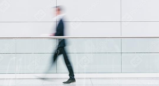 blurred businessman walking in a floor  : Stock Photo or Stock Video Download rcfotostock photos, images and assets rcfotostock | RC Photo Stock.:
