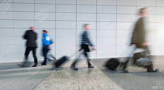 blurred commuters  walking on a trade fair corridor  : Stock Photo or Stock Video Download rcfotostock photos, images and assets rcfotostock | RC Photo Stock.: