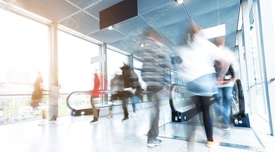 blurred commuters walking at a corridor  : Stock Photo or Stock Video Download rcfotostock photos, images and assets rcfotostock | RC Photo Stock.: