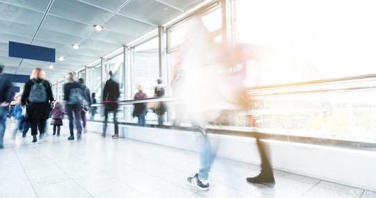 blurred commuters walking at a stradeshow  : Stock Photo or Stock Video Download rcfotostock photos, images and assets rcfotostock | RC Photo Stock.:
