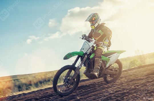 blurred motion Motocross MX rider racing on a dirt track  : Stock Photo or Stock Video Download rcfotostock photos, images and assets rcfotostock | RC Photo Stock.: