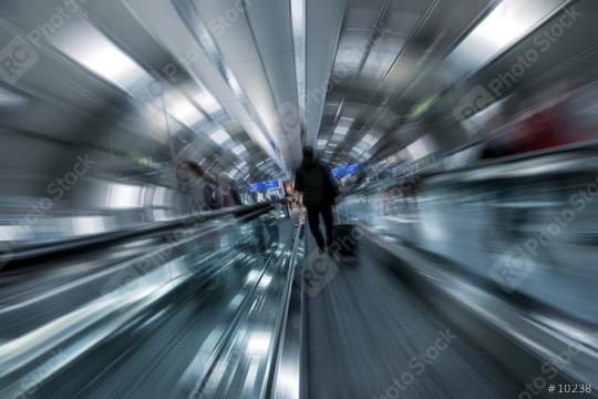 Blurred passengers using a escalator  : Stock Photo or Stock Video Download rcfotostock photos, images and assets rcfotostock | RC Photo Stock.: