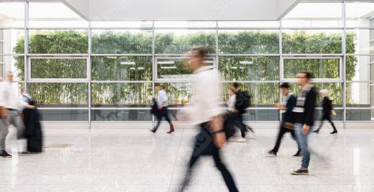 Blurred people go by hall to trade fair  : Stock Photo or Stock Video Download rcfotostock photos, images and assets rcfotostock | RC Photo Stock.: