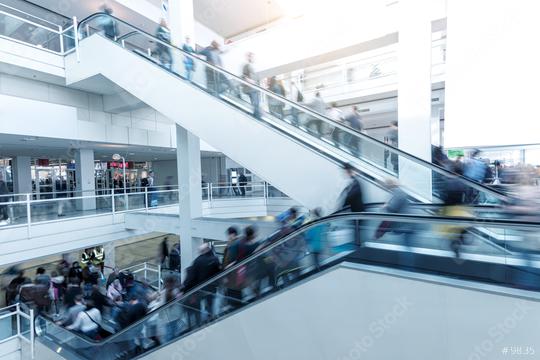 Blurred people using a escalator on a European Trade Fair  : Stock Photo or Stock Video Download rcfotostock photos, images and assets rcfotostock | RC Photo Stock.: