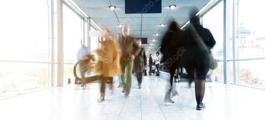 Blurred people using a modern walkway at a fair  : Stock Photo or Stock Video Download rcfotostock photos, images and assets rcfotostock | RC Photo Stock.: