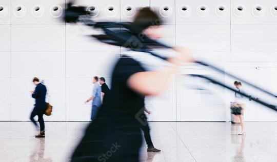 blurred photographer walking with tripod in a floor  : Stock Photo or Stock Video Download rcfotostock photos, images and assets rcfotostock | RC Photo Stock.: