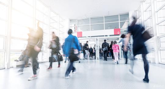 Blurred trade fair visitors at a entrance   : Stock Photo or Stock Video Download rcfotostock photos, images and assets rcfotostock | RC Photo Stock.: