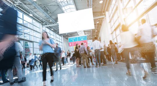 Blurred trade fair visitors walking in hall  : Stock Photo or Stock Video Download rcfotostock photos, images and assets rcfotostock | RC Photo Stock.: