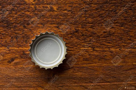 bottle cap on wood  : Stock Photo or Stock Video Download rcfotostock photos, images and assets rcfotostock | RC Photo Stock.: