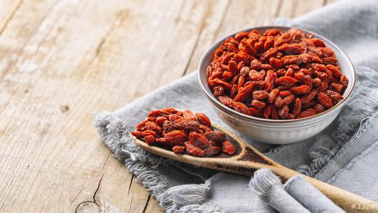 bowl with goji berries and spoon on the table  : Stock Photo or Stock Video Download rcfotostock photos, images and assets rcfotostock | RC Photo Stock.: