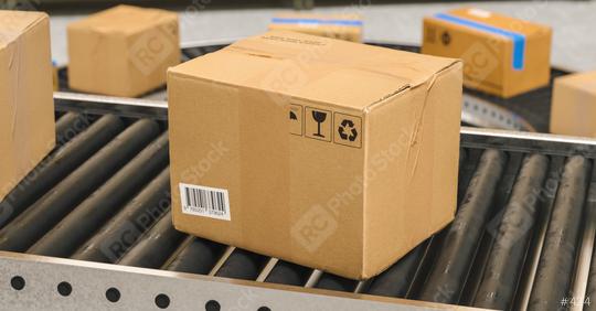 Box on conveyor roller. Warehouse or delivery concept image  : Stock Photo or Stock Video Download rcfotostock photos, images and assets rcfotostock | RC-Photo-Stock.:
