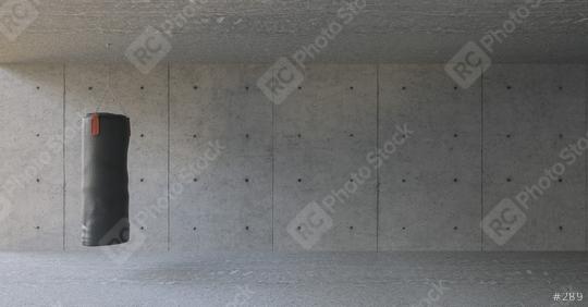 Boxing bag hangs in front of a gray concrete wall background in the fitness center  : Stock Photo or Stock Video Download rcfotostock photos, images and assets rcfotostock | RC Photo Stock.: