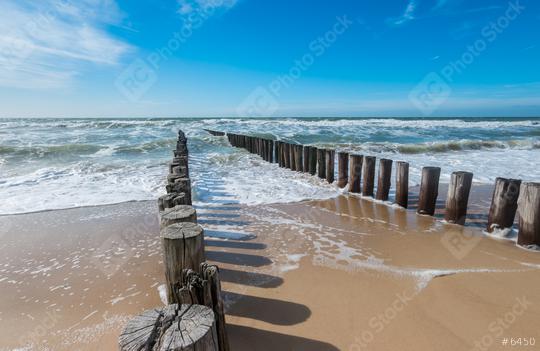 Breakwater of two rows of wooden poles at the Dutch North Sea coast   : Stock Photo or Stock Video Download rcfotostock photos, images and assets rcfotostock | RC Photo Stock.:
