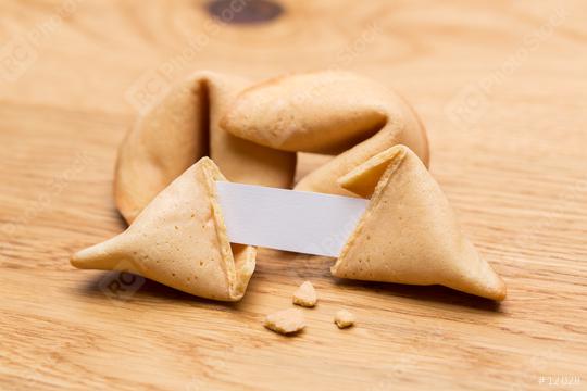 broken fortune cookie with a note   : Stock Photo or Stock Video Download rcfotostock photos, images and assets rcfotostock | RC-Photo-Stock.: