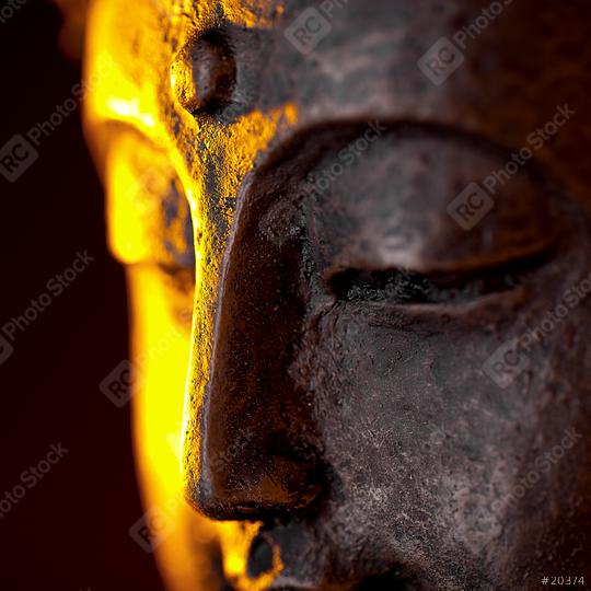 Buddha statue head close-up with glow against black background  : Stock Photo or Stock Video Download rcfotostock photos, images and assets rcfotostock | RC Photo Stock.: