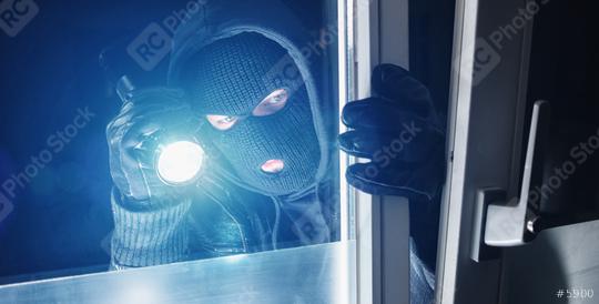 Burglar entering to house trough a window at night  : Stock Photo or Stock Video Download rcfotostock photos, images and assets rcfotostock | RC Photo Stock.: