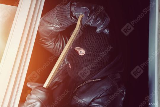Burglar trying to break into a house with a crowbar at night  : Stock Photo or Stock Video Download rcfotostock photos, images and assets rcfotostock | RC-Photo-Stock.: