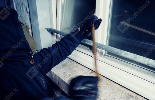 Burglar using crowbar to break into a house at night   : Stock Photo or Stock Video Download rcfotostock photos, images and assets rcfotostock | RC Photo Stock.: