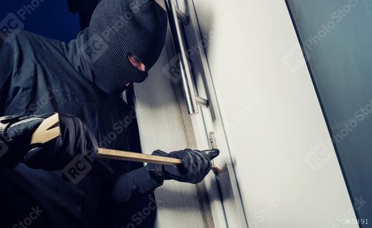Burglar wearing black clothes and breaking in a house at night  : Stock Photo or Stock Video Download rcfotostock photos, images and assets rcfotostock | RC Photo Stock.: