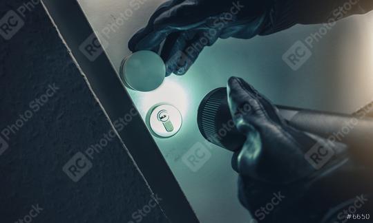 burglar with torch entering into a house door   : Stock Photo or Stock Video Download rcfotostock photos, images and assets rcfotostock | RC Photo Stock.: