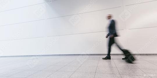 business commuter walking on a airport  : Stock Photo or Stock Video Download rcfotostock photos, images and assets rcfotostock | RC Photo Stock.: