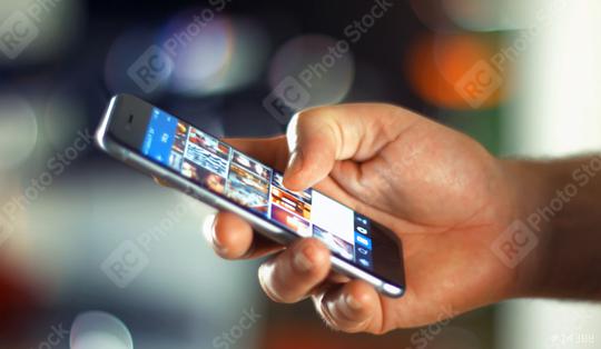Business Man using Apple iPhone 6s in Office  : Stock Photo or Stock Video Download rcfotostock photos, images and assets rcfotostock | RC-Photo-Stock.: