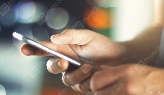 Business Man using Mobile Phone in Office  : Stock Photo or Stock Video Download rcfotostock photos, images and assets rcfotostock | RC Photo Stock.: