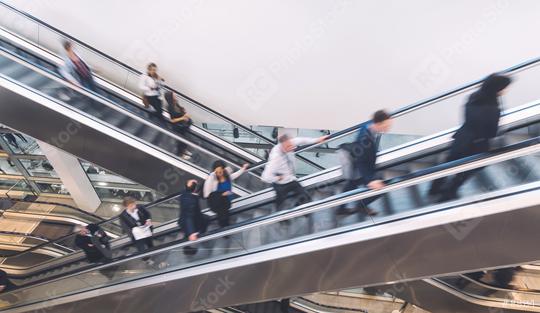 business people at an escalator  : Stock Photo or Stock Video Download rcfotostock photos, images and assets rcfotostock | RC Photo Stock.: