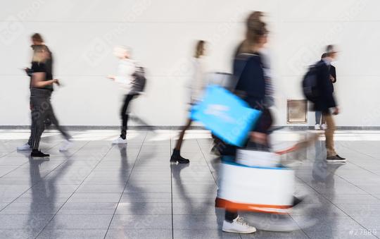 Business people go as a business group on trade fair or conference  : Stock Photo or Stock Video Download rcfotostock photos, images and assets rcfotostock | RC Photo Stock.: