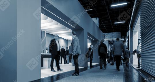Business People Walking between trade show stands  : Stock Photo or Stock Video Download rcfotostock photos, images and assets rcfotostock | RC Photo Stock.: