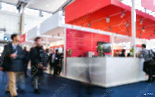 business people walking in trade fair booth Intentionally blurred background  : Stock Photo or Stock Video Download rcfotostock photos, images and assets rcfotostock | RC Photo Stock.: