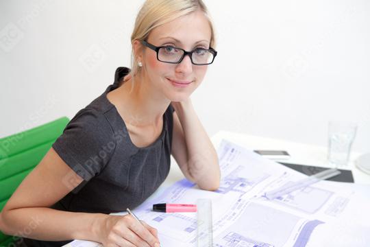 Business woman with blueprint  : Stock Photo or Stock Video Download rcfotostock photos, images and assets rcfotostock | RC Photo Stock.: