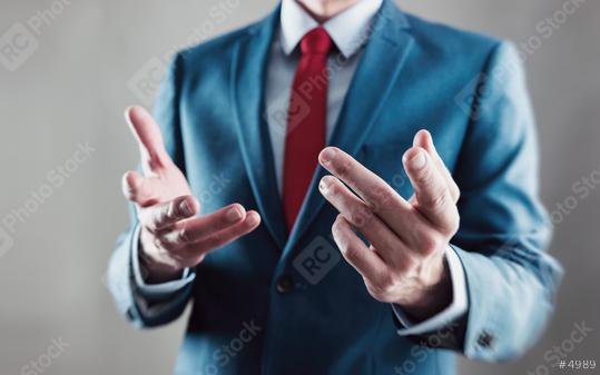 businessman explained his strategy with hands  : Stock Photo or Stock Video Download rcfotostock photos, images and assets rcfotostock | RC Photo Stock.:
