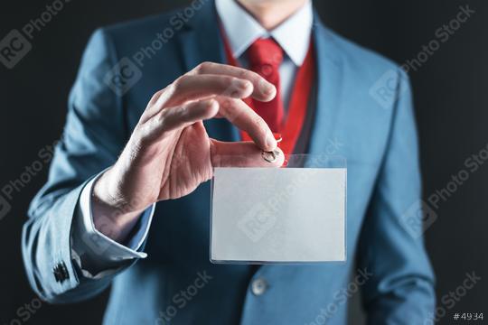 Businessman holding blank security identity ID Card  : Stock Photo or Stock Video Download rcfotostock photos, images and assets rcfotostock | RC Photo Stock.: