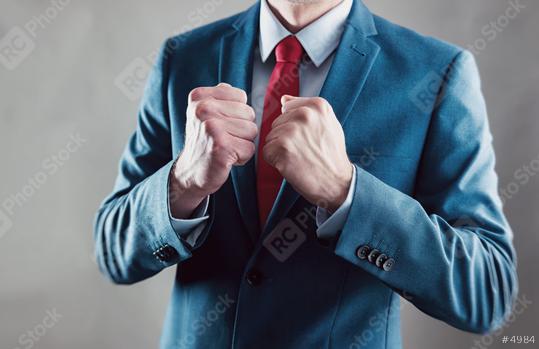 businessman raising fist and celebrating victory with hands - business gesture and people concept image  : Stock Photo or Stock Video Download rcfotostock photos, images and assets rcfotostock | RC Photo Stock.:
