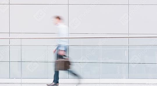 Businessman walks in a futuristic corridor  : Stock Photo or Stock Video Download rcfotostock photos, images and assets rcfotostock | RC Photo Stock.: