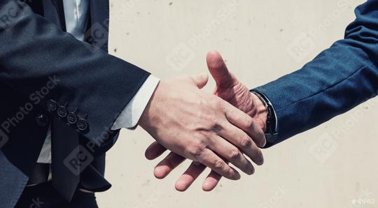 businessmen handshaking process after good deal  : Stock Photo or Stock Video Download rcfotostock photos, images and assets rcfotostock | RC Photo Stock.: