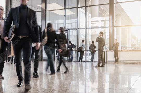 businesspeople walking in the corridor of an trade fair  : Stock Photo or Stock Video Download rcfotostock photos, images and assets rcfotostock | RC Photo Stock.: