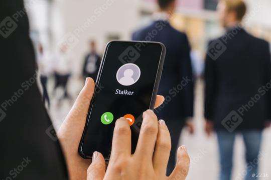 Businesswoman gets a Phone call from a stalker. Stalking or bullying with smartphone concept. Stalker caller, scammer or stranger. Woman answering to incoming call. Ex boyfriend with fake identity.  : Stock Photo or Stock Video Download rcfotostock photos, images and assets rcfotostock | RC Photo Stock.: