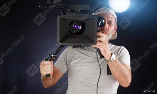 cameraman working with a cinema camera  : Stock Photo or Stock Video Download rcfotostock photos, images and assets rcfotostock | RC Photo Stock.: