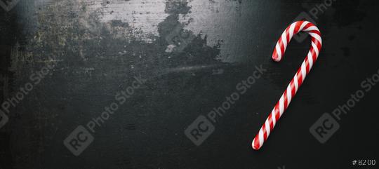 candy canes in Christmas colours on a dark surface, including copy space  : Stock Photo or Stock Video Download rcfotostock photos, images and assets rcfotostock | RC Photo Stock.: