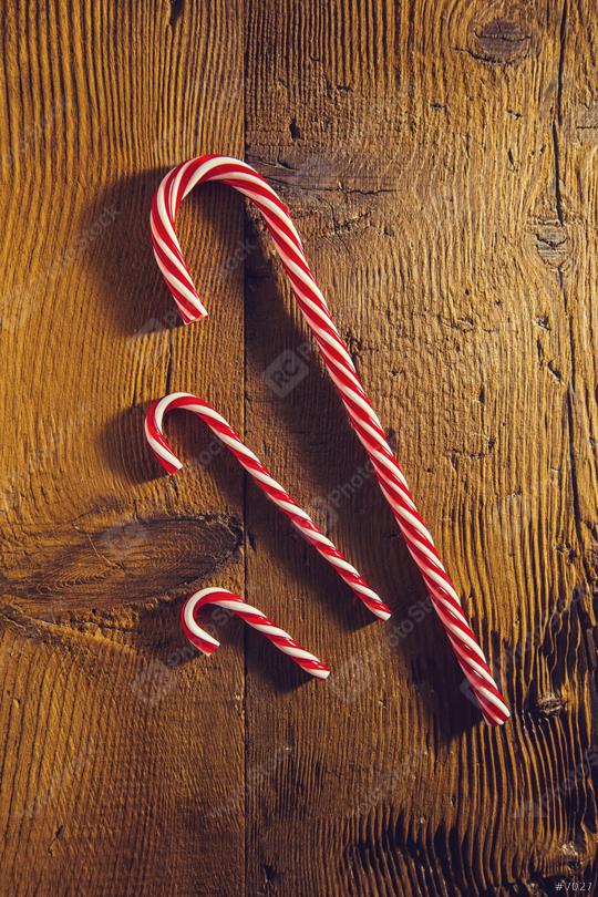 candy canes in Christmas colours on wooden background  : Stock Photo or Stock Video Download rcfotostock photos, images and assets rcfotostock | RC Photo Stock.: