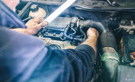 car service, repair, maintenance and people concept - auto mechanic man with lamp working at workshop  : Stock Photo or Stock Video Download rcfotostock photos, images and assets rcfotostock | RC Photo Stock.: