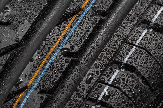Car tire aquaplaning risk tire with raindrops  : Stock Photo or Stock Video Download rcfotostock photos, images and assets rcfotostock | RC Photo Stock.: