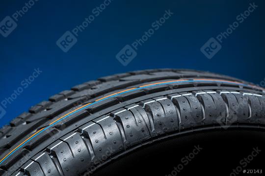 Car tire on black blue bakground   : Stock Photo or Stock Video Download rcfotostock photos, images and assets rcfotostock | RC Photo Stock.: