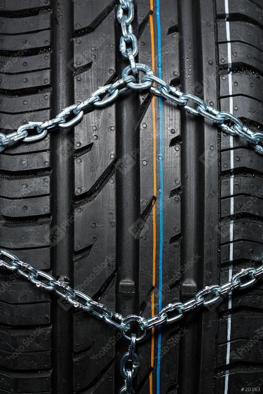Car tire with snow chains  : Stock Photo or Stock Video Download rcfotostock photos, images and assets rcfotostock | RC-Photo-Stock.: